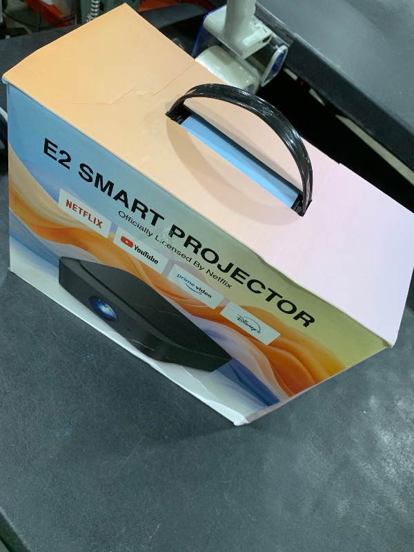 Photo 1 of [2025 Netflix-Licensed | 386+ Built-in Apps] DBPOWER E2 Smart Projector with WiFi and Bluetooth, Mini Projector 4K Support with Netflix, Youtube, Disney+, Hulu, Max, Crunchyroll w Portable Case