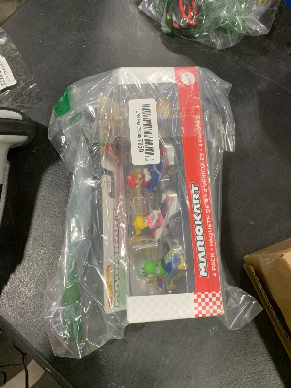 Photo 1 of Hot Wheels Mario Kart Vehicle 4-Pack, Set of 4 Fan-Favorite Characters Includes 1 Exclusive Model, Collectible Gift for Kids & Fans Ages 3 Years Old & Up