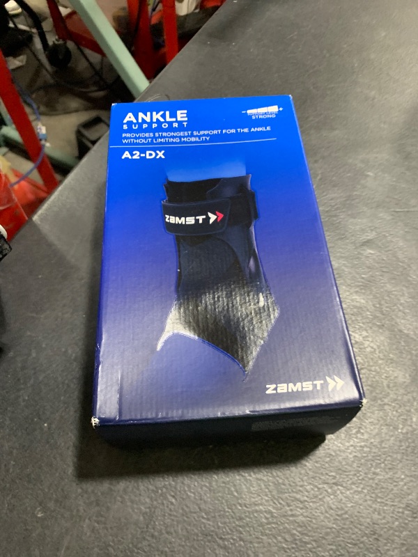 Photo 1 of Zamst A2-DX Sports Ankle Brace with Protective Guards For High Ankle Sprains and Chronic Ankle Instability-for Basketball, Volleyball, Lacrosse, Football-Black, Left, Medium
