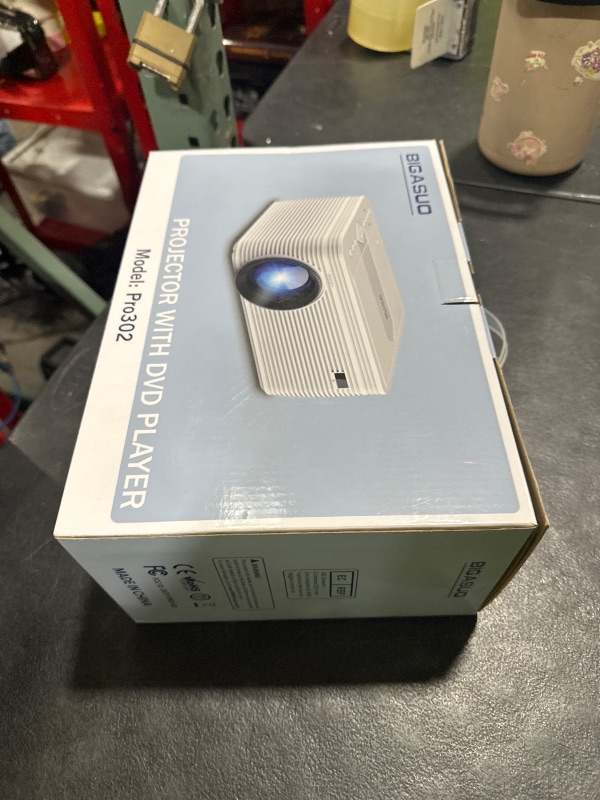 Photo 1 of BIGASUO HD 9000L Bluetooth Projector Built in DVD Player, Mini Projector 1080P and 250”Supported with Tripod/ Carry Bag, Projector Compatible w/ TV Stick, PS5, Laptop, Portable Outdoor Movie Projector