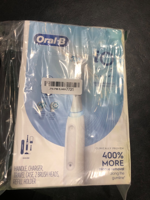 Photo 1 of Oral-B iO Deep Clean Rechargeable Electric Powered Toothbrush, White with iO Series 3 Limited, 2 Brush Heads and Travel Case - Pressure Sensor to Protect Gums - 3 Cleaning Settings - 2 Minute Timer