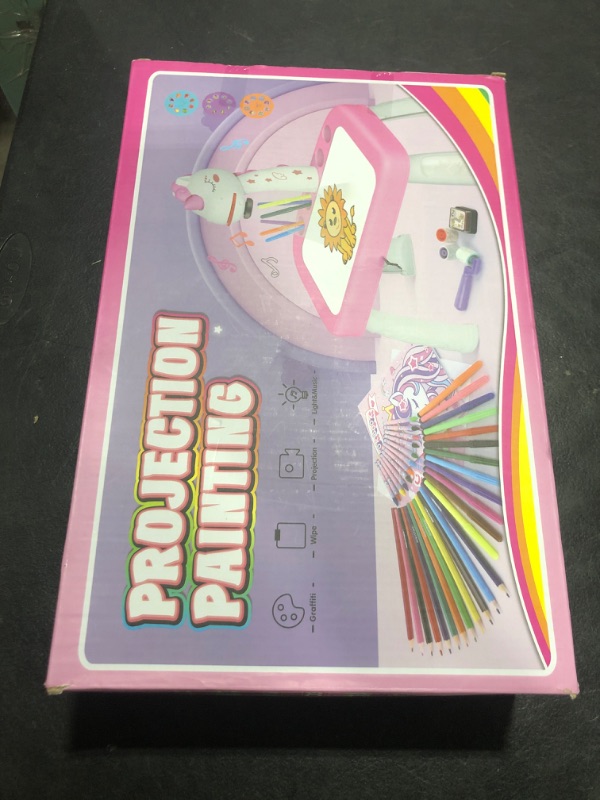 Photo 1 of Drawing Projector for Kids, Art and Crafts, Drawing Board with Music, Color Pens, Pencils, Crayons, Scrapbook, Unicorn Sticker Book, Ideal Toy for 3+ Year Old Girls & Boys (Unicorn Kit)