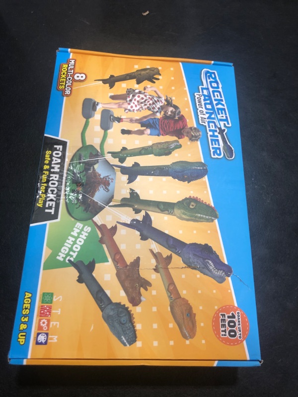 Photo 1 of Dinosaur Rocket Launcher for Kids - Launch Up to 100 Ft, 8 Rockets and 2 Pads for Multi-Player, Dinosaur Toys, Birthday Gift Ideas, Toys for 3 4 5 6 7 Year Old Boys, Outdoor Outside Toys