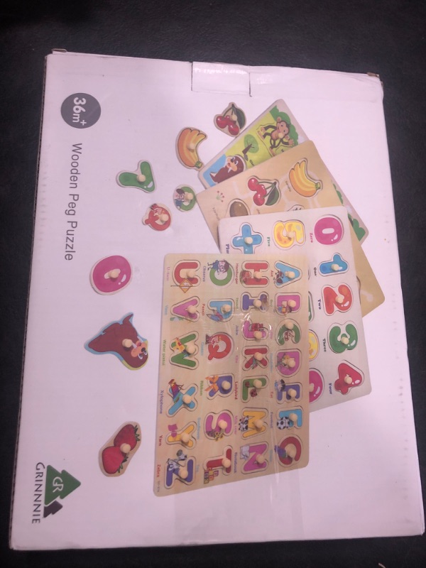 Photo 1 of GRINNNIE Wooden Peg Puzzle for Toddlers 2 3 4 Years Old, 4 PCS Montessori Educational Learning Puzzles Set-Numbers, Letters, Animals and Fruits, Great Preschool Gifts for Girls and Boys