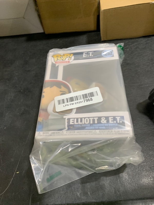 Photo 1 of Funko Pop Movies: E.T. The Extra-Terrestrial - Elliott - Elliot with E.T. in Basket, 3.75 Inches - Collectable Vinyl Figure - Gift Idea - Official Merchandise