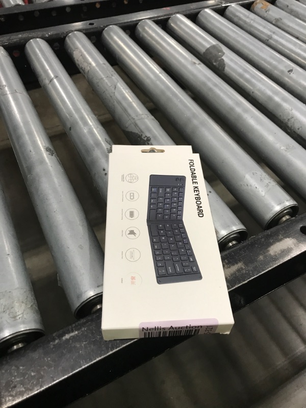 Photo 1 of Foldable Bluetooth Keyboard, Wireless Silent Ergonomic Keyboard Mini Folding Rechargeable Small Keyboard, Fasting Charging Long Battery Life Keyboards for iOS Android Windows Tablet Laptop (Gray)