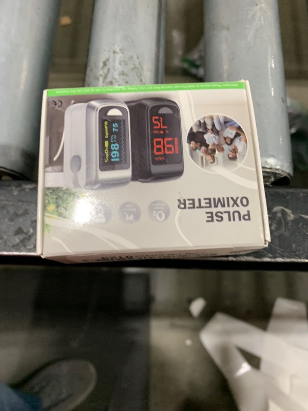 Photo 1 of Fingertip Pulse Oximeter Blood Oxygen Monitor Pulse Ox, Heart Rate and Fast Spo2 Reading Oxygen Meter with OLED Screen Included Batteries and Lanyard