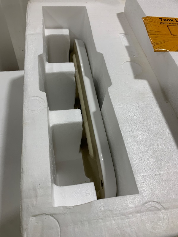 Photo 1 of SYMMETRY One-Piece Elongated Toilet, 1.28 GPF Single-Flush
