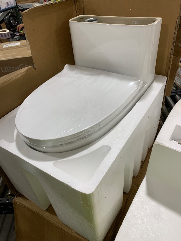 Photo 1 of SYMMETRY One-Piece Elongated Toilet, 1.28 GPF Single-Flush