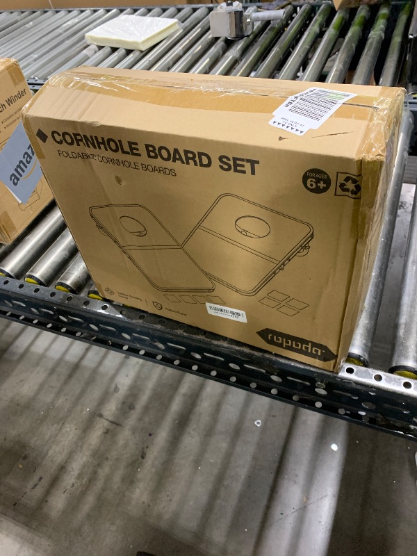 Photo 1 of ROPODA Portable Cornhole Board Set, 24 x 16 in Corn Hole Games for Adults with 8 Bean Bags, Lightweight Aluminum Alloy Edging Cornhole Set for Outdoor Games,Beach and Tailgates.