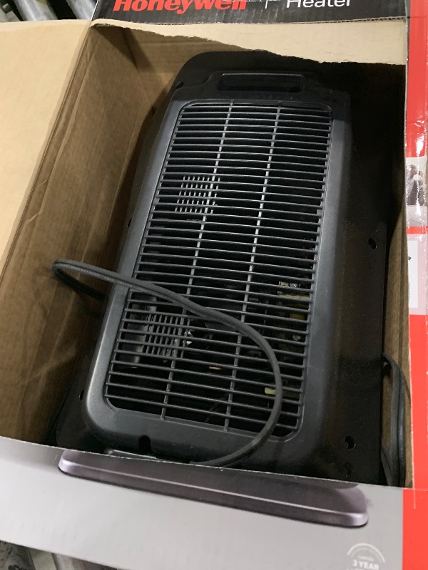 Photo 1 of Honeywell HeatGenius Ceramic Heater, Black – Easy to Use Space Heater with Multi-Directional Heating, Digital Controls and Programmable Thermostat