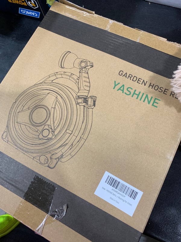 Photo 1 of YASHINE Retractable Garden Hose Reel, Portable Hose Reel, 45+5FT with 10 Patterns Spray Nozzle, Adapts to standard US hose plugs, 50FT Hose Reel for Garden Watering Car Washing Pet -Green