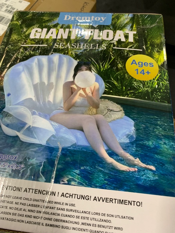 Photo 1 of 52" Thickened Inflatable Seashell Pool Float, Giant Pool Floating Raft Chair with Pearl Balls, for Birthday Party, Ocean Theme Decorations, Beach & Pool Party Decorations