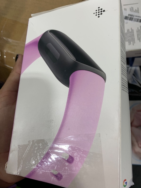Photo 1 of Fitbit Inspire 3 Health &-Fitness-Tracker with Stress Management, Workout Intensity, Sleep Tracking, 24/7 Heart Rate and more, Lilac Bliss/Black, One Size (S & L Bands Included)