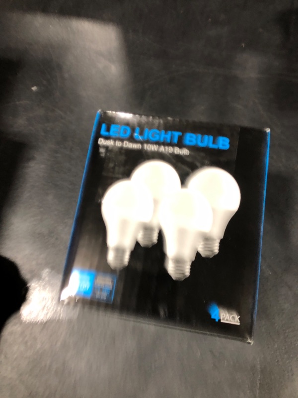 Photo 1 of 4 Pack Dusk to Dawn LED Light Bulbs 10W(75W Equivalent), 3000K Soft White 1100LM,E26 A19 Automatic Sensor Bulb, Built-in Photocell Detector for Garage Door, Porch, Outdoor Lighting(Non-Dimmable)