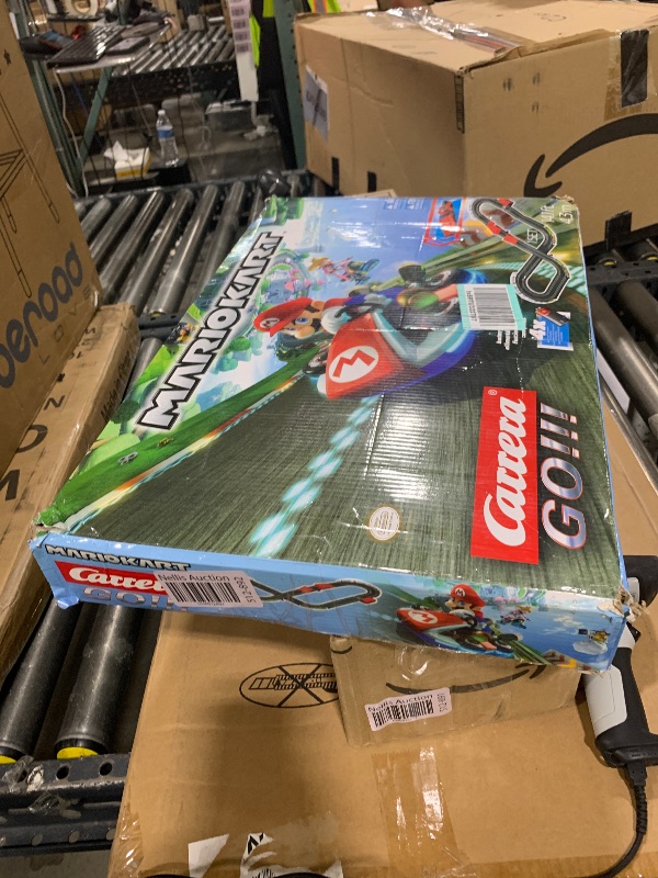 Photo 1 of ITEM IS MISSING PARTS, UNSURE WHAT PARTS ARE MISSING ---------------------------------------Carrera GO!!! 63503 Official Licensed Mario Kart Battery Operated 1:43 Scale Slot Car Racing Toy Track Set with Jump Ramp Featuring Mario and Luigi for Kids Ages 5