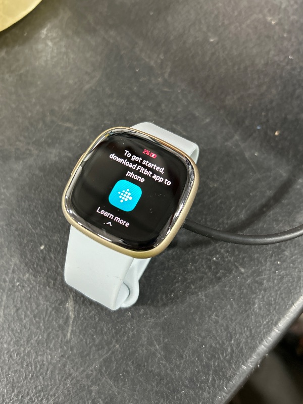 Photo 1 of Fitbit Sense 2 Advanced Health and Fitness Smartwatch with Tools to Manage Stress and Sleep, ECG App, SpO2, 24/7 Heart Rate and GPS, Blue Mist/Pale Gold, One Size (S & L Bands Included)