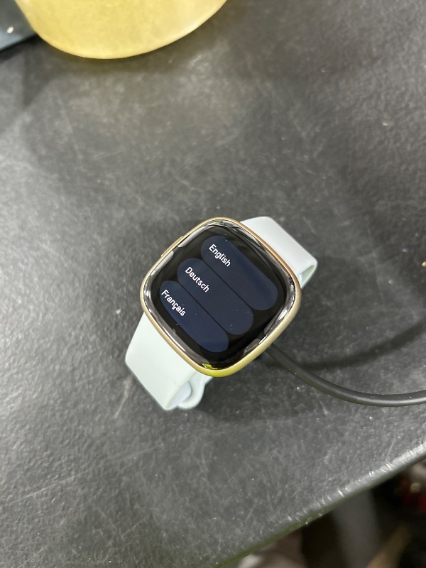 Photo 1 of Fitbit Sense 2 Advanced Health and Fitness Smartwatch with Tools to Manage Stress and Sleep, ECG App, SpO2, 24/7 Heart Rate and GPS, Blue Mist/Pale Gold, One Size (S & L Bands Included)