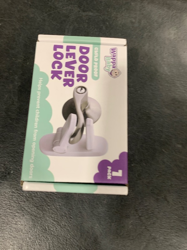 Photo 1 of Door Lever Lock (1 Pack) Prevents Toddlers from Opening Doors. 3.25" L * 1.5" W * 4.5" H Easy One Hand Operation for Adults. Durable ABS with 3M Adhesive Backing. Simple Install, No Tools Needed.