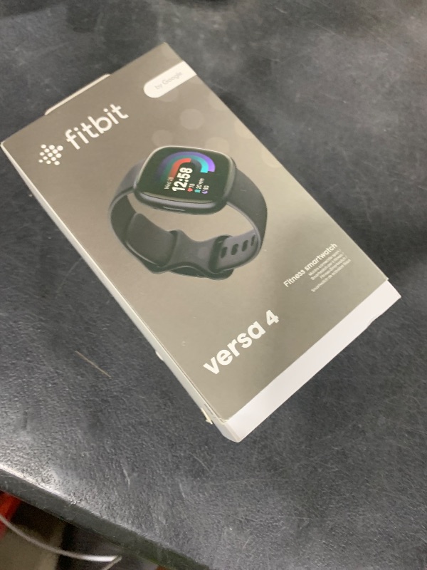 Photo 1 of Fitbit Versa 4 Fitness Smartwatch with Daily Readiness, GPS, 24/7 Heart Rate, 40+ Exercise Modes, Sleep Tracking and more, Black/Graphite, One Size (S & L Bands Included)