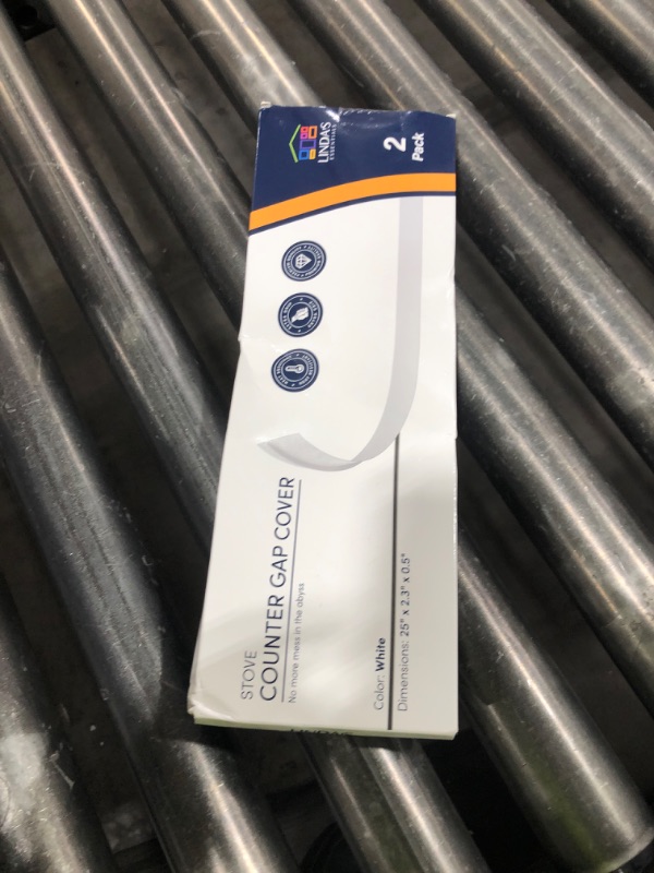 Photo 1 of Linda’s Essentials Silicone Stove Gap Covers (2 Pack), Heat Resistant Oven Gap Filler Seals Spaces Between Stovetop and Counter, Easy to Clean Stove Side Guard (25 Inches, White)