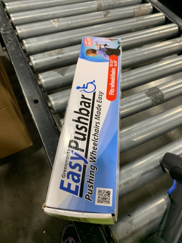 Photo 1 of Greenmont'sEasyPushbar (TM) Ergonomic Handlebar Allows Caregiver to Stand Straighter with Less Stress and Strain on Hands, arms and Back.