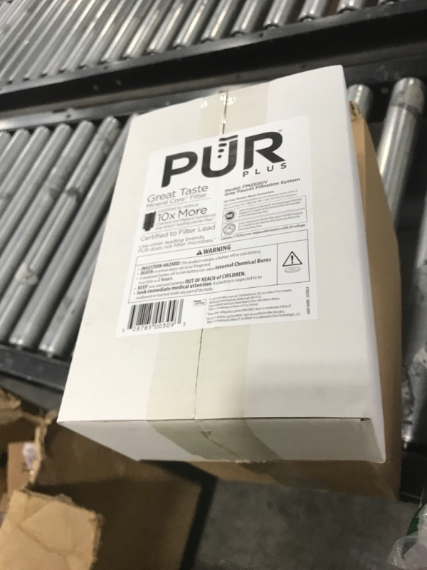 Photo 1 of PUR PLUS Vertical Faucet Mount Water Filtration System, Lead-Reducing Filter, Great-Tasting Water, Easy Install, Lasts 100 Gallons, Compatible with Sinks with External Aerators, Grey