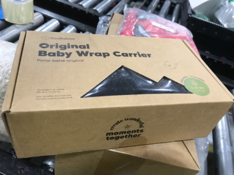 Photo 1 of KeaBabies Baby Wrap Carrier - All in 1 Original Baby Carrier Newborn to Toddler Sling, Easy to Wear, Hands Free Bonding, Lightweight, Breathable Infant Wraps (Trendy Black)