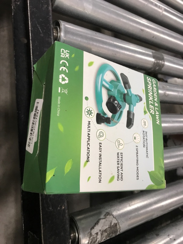 Photo 1 of Sprinklers for Yard, Water Sprinkler for Lawn, 360 Degree Rotating Lawn Sprinkler for Yard Large Area, Sprinklers for Kids, Pets Playing
