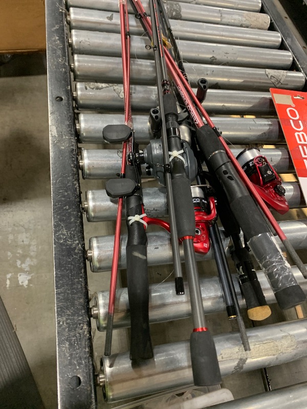 Photo 1 of Zebco Dock Demon Spinning Reel and Fishing Rod Combo, 30-inch 1-Piece Fiberglass Fishing Pole, EVA Rod Handle, Size 10 Reel, Powertrain Drag, Pre-Spooled with 6-Pound Zebco Line, Red