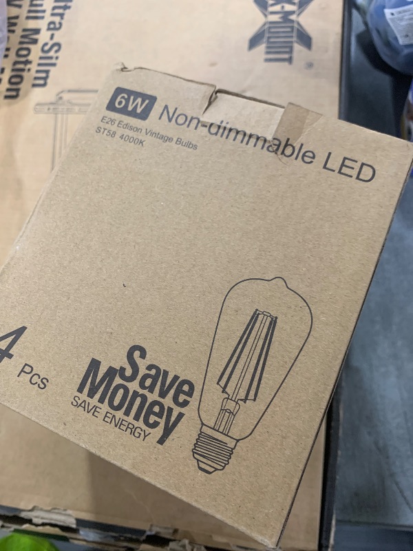Photo 1 of Brightever Vintage LED Edison Bulbs 60 Watt Equivalent, 6W ST58 Super Bright 4000K Neutral Daylight White, Clear Glass Style 700Lumens Antique LED Filament Bulbs, E26 Base, Non-dimmable, 4 Packs