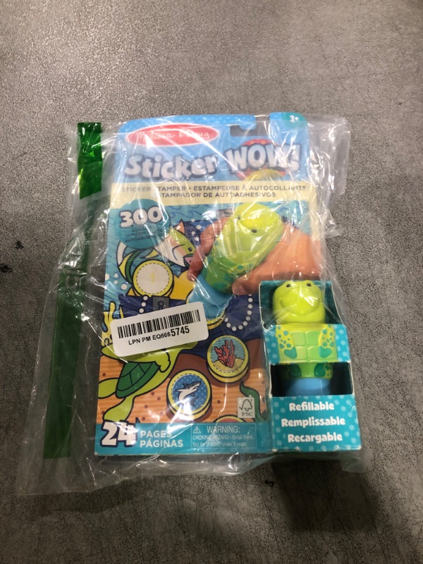 Photo 1 of Melissa & Doug Sticker Wow!™ 24-Page Activity Pad and Sticker Stamper, 300 Stickers, Arts and Crafts Fidget Toy Collectible Character – Sea Turtle - FSC Certified