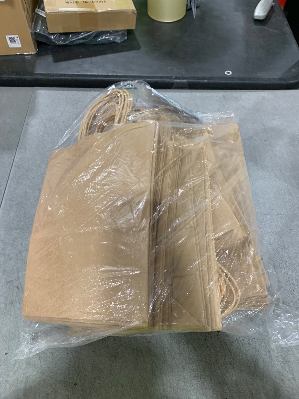 Photo 1 of GSSUSA 100 Pack Paper Gift Bags 5.25x3.75x8 Inch Small Brown Paper Bags with Handles Bulk, Brown Kraft Bag for Small Business, Sturdy Grocery Retail Shopping Birthday Party Favor Craft Bag ?Made in USA?