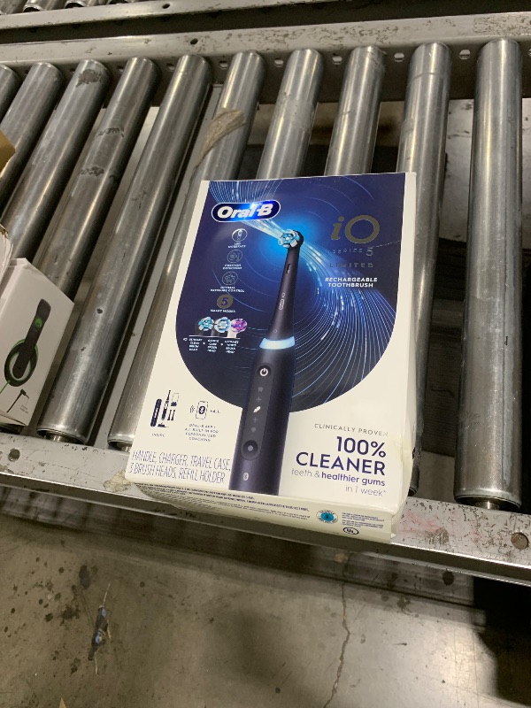 Photo 1 of Oral-B iO Deep Clean + Whiten Rechargeable Electric Toothbrush with Visible Pressure Sensor, 2 Minute Timer, 5 Cleaning Settings, 1 iO5 Limited, 3 Toothbrush Heads, Travel Case & Refill Holder, Black