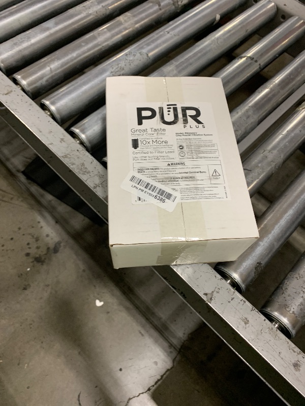 Photo 1 of PUR PLUS Vertical Faucet Mount Water Filtration System, Lead-Reducing Filter, Great-Tasting Water, Easy Install, Lasts 100 Gallons, Compatible with Sinks with External Aerators, Grey