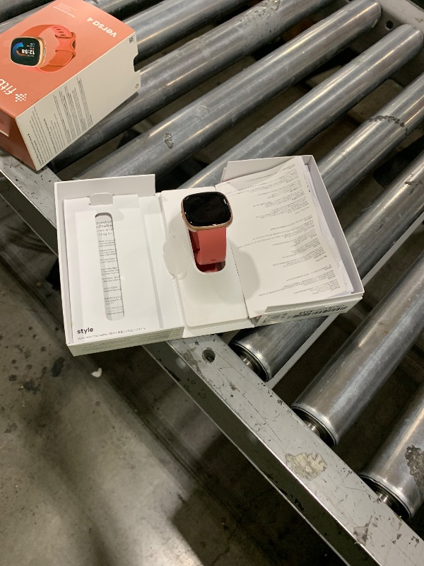 Photo 1 of Fitbit Versa 4 Fitness Smartwatch with Daily Readiness, GPS, 24/7 Heart Rate, 40+ Exercise Modes, Sleep Tracking and more, Pink Sand/Copper Rose, One Size (S & L Bands Included)