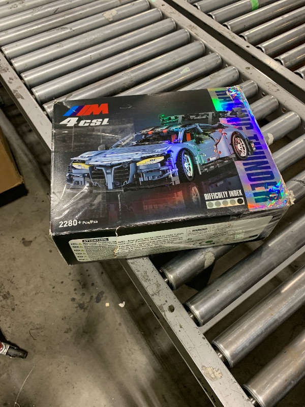 Photo 1 of Remote Control Car Building Kit, 1:10 M4 Champion Racing Car Building Blocks and Challenge Construction Toys, Gift for Technical Enthusiasts Adults&Boys Age 14+, with Motors Light Battery (2280PCS)
