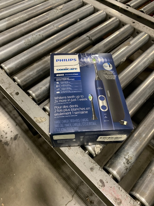 Photo 1 of Philips Sonicare ProtectiveClean 6500 Rechargeable Electric Toothbrush, with Pressure Sensor, 3 Cleaning Modes, SmarTimer and QuadPacer, 14-Day Battery Life, Charging Travel Case, Navy Blue, HX6462/07