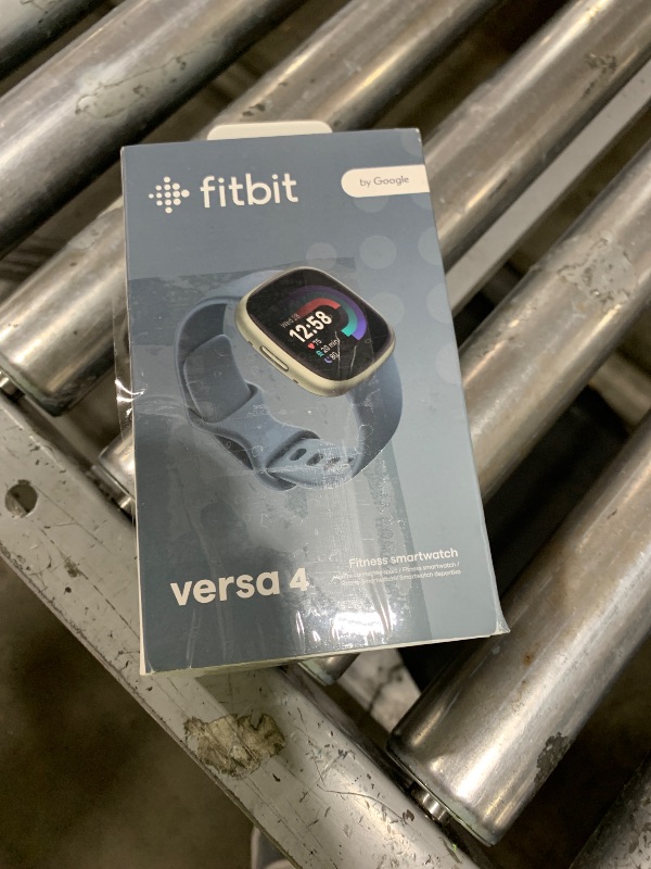 Photo 1 of Fitbit Versa 4 Fitness Smartwatch with Daily Readiness, GPS, 24/7 Heart Rate, 40+ Exercise Modes, Sleep Tracking and more, Waterfall Blue/Platinum, One Size (S & L Bands Included)
