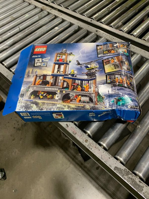 Photo 1 of LEGO City Police Prison Island Toy Building Set, Birthday Gift for Boys and Girls Ages 7 Plus, Imaginative Play, Helicopter Toy, Boat Toy and Dinghy, 7 Minifigures with Dog and Shark Toy, 60419