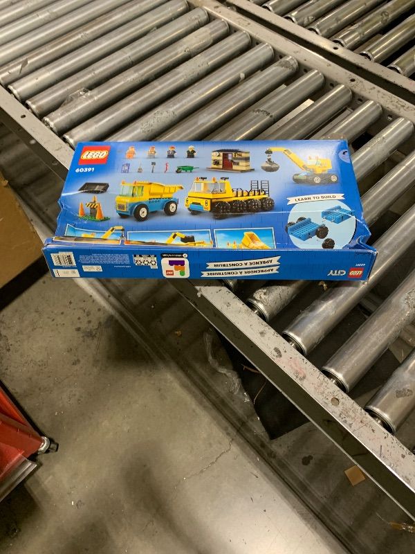 Photo 1 of LEGO City Construction Trucks and Wrecking Ball Crane 60391 Building Toy Set for Toddler Kids Ages 4+, Includes 3 Construction Vehicles, an Abandoned House and 3 Minifigures for Pretend Play