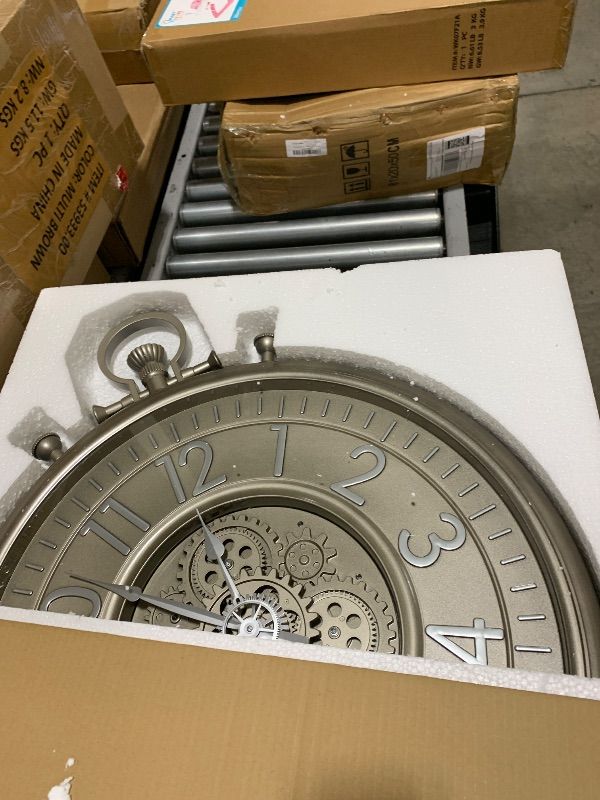 Photo 1 of AYRELY® 24IN Decorative Moving Gear Large Wall Clock, Oversized Industrial Steampunk Gears, Big Numerals Wall Clock for Modern Living Room Decor (Silver)