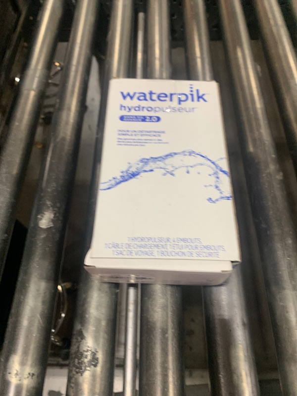 Photo 1 of Waterpik Cordless Advanced 2.0 Water Flosser For Teeth, Gums, Braces, Dental Care With Travel Bag and 4 Tips, ADA Accepted, Rechargeable, Portable, and Waterproof, White WP-580, Packaging May Vary