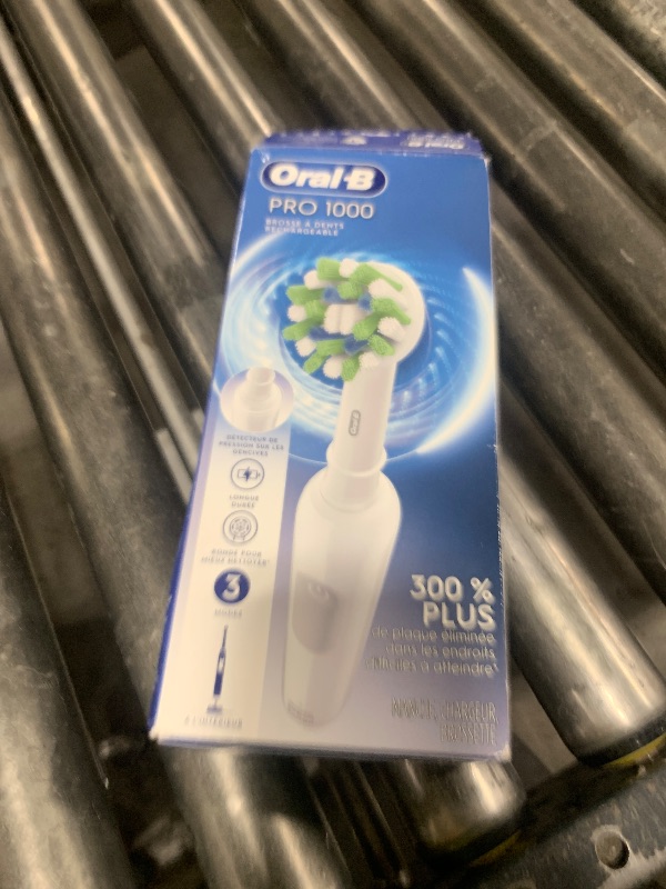 Photo 1 of Oral-B Pro 1000 Rechargeable Electric Toothbrush, White