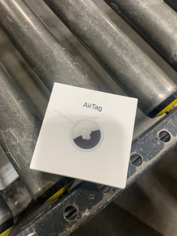 Photo 1 of Apple AirTag. Keep Track of and find Your Keys, Wallet, Luggage, Backpack, and More. Simple one-tap Set up with iPhone or iPad