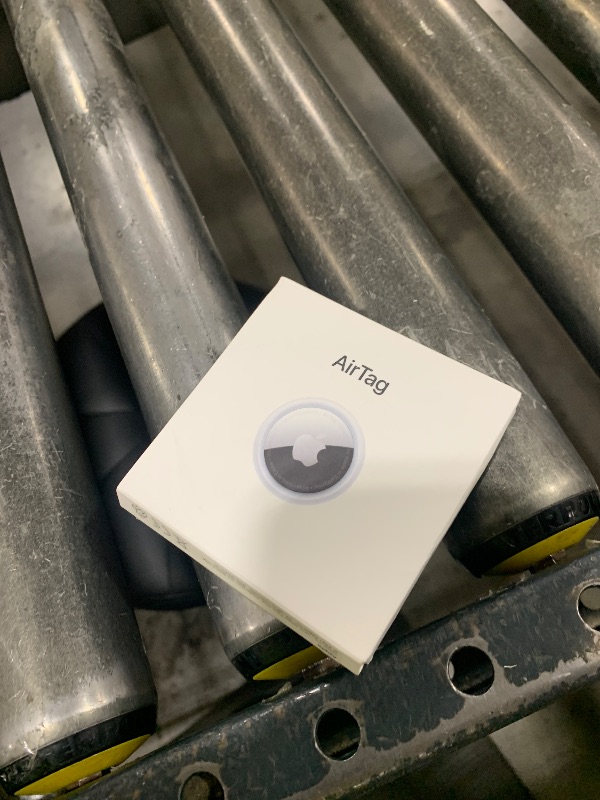 Photo 1 of Apple AirTag. Keep Track of and find Your Keys, Wallet, Luggage, Backpack, and More. Simple one-tap Set up with iPhone or iPad
