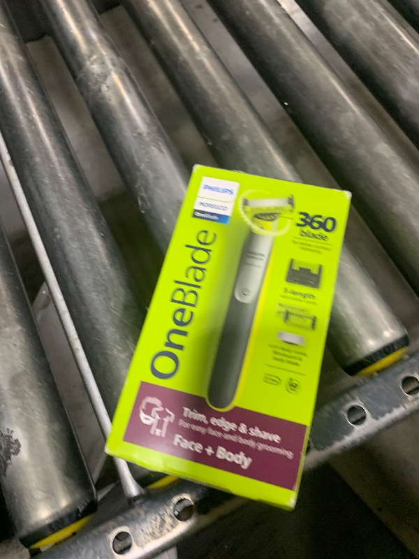 Photo 1 of Philips Norelco OneBlade 360 Hybrid Face + Body, Electric Beard Trimmer, Shaver and Body Groomer, with 360 Blade Technology, 1x 360 Blade for Face, 5in1 Adjustable Comb, 1x Body Kit, Model QP2834/70