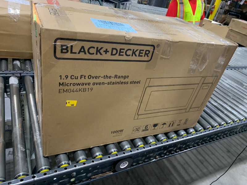 Photo 1 of BLACK+DECKER EM044KB19 Over The Range Microwave Oven with One Touch, 1000 Watts, 400 CFM and Auto Cooking, OTR 1.9 Cu.ft