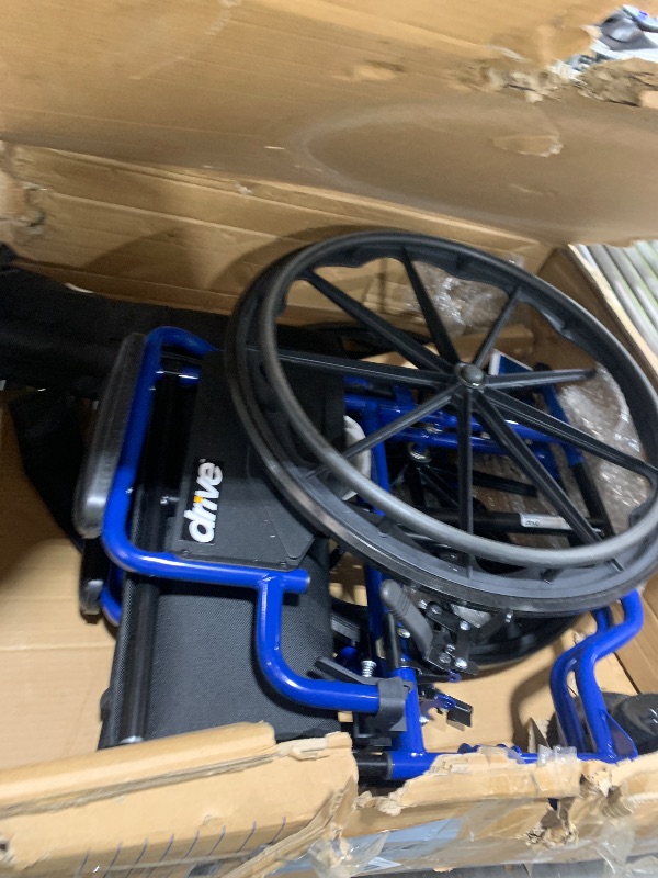 Photo 1 of Drive Medical Blue Streak Wheelchair with Flip Back Desk Arms and Swing Away Footrests - 18" Seat
