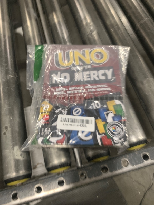 Photo 1 of Mattel Games UNO Show ‘em No Mercy Card Game in Storage & Travel Tin for Kids, Adults & Family Night with Extra Cards, Special Rules & Tougher Penalties (Amazon Exclusive)